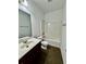 Bathroom featuring sink and shower with tub at 20 Chapman Way, Covington, GA 30016