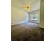 Bedroom featuring carpet, ceiling fan and window at 20 Chapman Way, Covington, GA 30016