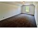 Bonus room featuring carpet and a window at 20 Chapman Way, Covington, GA 30016