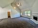 Cozy living room with fireplace and stairs at 20 Chapman Way, Covington, GA 30016