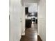 View from doorway into modern kitchen featuring granite counters, and stainless steel appliances at 233 Banberry Se Dr, Atlanta, GA 30315