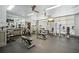 Well-equipped fitness center with weights and cardio machines at 77 Peachtree Ne Pl # 107, Atlanta, GA 30309