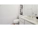 Modern powder room with elegant fixtures, sleek vanity, and stylish decor for a contemporary aesthetic at 1675 Bookhout Dr, Cumming, GA 30041