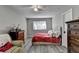 Bedroom with closet, ceiling fan and window at 1824 Guardian Way, Lawrenceville, GA 30043