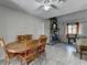 Dining room featuring a ceiling fan, fireplace and outdoor access through French doors at 1824 Guardian Way, Lawrenceville, GA 30043