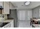 Eat-in kitchen featuring stainless steel appliances, granite countertops and tile flooring at 1824 Guardian Way, Lawrenceville, GA 30043