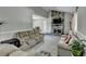 Inviting living room with a stone fireplace, vaulted ceilings, and neutral tones at 1824 Guardian Way, Lawrenceville, GA 30043