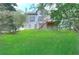 View of the backyard, including the deck and staircase accessible from the upper level at 2869 Hickory Run Cir, Duluth, GA 30096