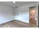 Bedroom includes wood-look floors and closet with space for storage at 2869 Hickory Run Cir, Duluth, GA 30096