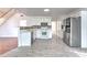 Modern kitchen with stainless steel appliances and breakfast bar seating at 2869 Hickory Run Cir, Duluth, GA 30096