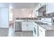 Updated kitchen boasts stainless steel appliances and modern countertops at 2869 Hickory Run Cir, Duluth, GA 30096