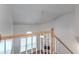Upstairs view of the living room with soaring ceilings and a fireplace at 2869 Hickory Run Cir, Duluth, GA 30096