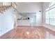 Open-concept living space with hardwood floors and a view into the updated kitchen at 2869 Hickory Run Cir, Duluth, GA 30096