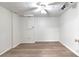 Clean and well-lit room with vinyl floors, ceiling fan, and lots of potential at 2869 Hickory Run Cir, Duluth, GA 30096