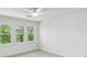 Serene bedroom with a ceiling fan and abundant natural light at 3794 Ashford Lake Ne Ct, Brookhaven, GA 30319