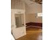 Dining room with hardwood floors, a chandelier, and a pass-through to the kitchen at 412 Hawkstone Way, Alpharetta, GA 30022