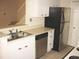 Kitchen with stainless steel appliances, double sink, dishwasher, and white cabinets at 412 Hawkstone Way, Alpharetta, GA 30022