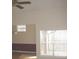 Bright living room with hardwood floors and large windows at 412 Hawkstone Way, Alpharetta, GA 30022