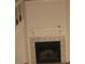 Living room with a fireplace and staircase at 412 Hawkstone Way, Alpharetta, GA 30022