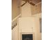 Cozy living room with a fireplace and easy access to the staircase at 412 Hawkstone Way, Alpharetta, GA 30022