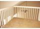 Cozy loft with carpet flooring overlooking another room at 412 Hawkstone Way, Alpharetta, GA 30022