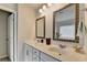 Bathroom features a double sink vanity with sleek chrome fixtures and ample storage at 4215 Cordova Ln, Cumming, GA 30028