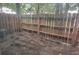 Small backyard enclosed by a wooden fence at 4701 Flat Shoals Rd # 56D, Union City, GA 30291