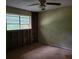Bedroom with window and damaged walls at 4701 Flat Shoals Rd # 56D, Union City, GA 30291