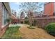 Charming backyard featuring a private patio and a well-maintained lawn at 6275 Glen Oaks Ln, Atlanta, GA 30328