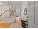 Inviting foyer with hardwood floors, staircase, and neutral decor at 6275 Glen Oaks Ln, Atlanta, GA 30328