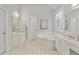 The primary bathroom features double vanities, soaking tub, and a separate shower to relax and unwind at 6275 Glen Oaks Ln, Atlanta, GA 30328