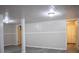 Bright basement featuring gray flooring and convenient access to doors at 6470 Sherwood Trl, Austell, GA 30168