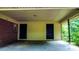 Attached carport with two doors and brick siding at 6470 Sherwood Trl, Austell, GA 30168