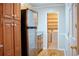 Kitchen with stainless steel refrigerator, granite countertops, and view of laundry room at 6470 Sherwood Trl, Austell, GA 30168