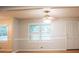 Living room featuring large windows and neutral wall colors at 6470 Sherwood Trl, Austell, GA 30168