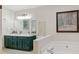 Bright bathroom with a large green vanity, soaking tub, and picture window showcases a functional layout at 1149 Midland Nw Dr, Acworth, GA 30102