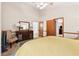 A spacious bedroom with high ceilings, comfortable bed, and functional furniture offers a relaxing and stylish retreat at 1149 Midland Nw Dr, Acworth, GA 30102