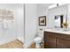 Clean, bright bathroom with a glass enclosed shower, white subway tiles, a granite countertop and modern fixtures at 2498 Perry Nw Blvd, Atlanta, GA 30318
