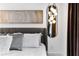 Comfortable bedroom features stylish decor and a modern hanging light fixture at 2498 Perry Nw Blvd, Atlanta, GA 30318