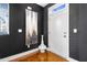 Modern entryway features stylish decor, a white door, and dark walls at 2498 Perry Nw Blvd, Atlanta, GA 30318