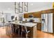 Contemporary kitchen with stainless steel appliances, white countertops, and sleek cabinets at 2498 Perry Nw Blvd, Atlanta, GA 30318