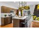 Well-equipped kitchen with an island, quartz counters, and modern appliances at 2498 Perry Nw Blvd, Atlanta, GA 30318