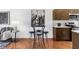 Bright kitchen featuring granite countertops, wood cabinets, and stylish bar stool seating at 2498 Perry Nw Blvd, Atlanta, GA 30318