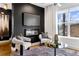Stylish living room featuring a modern fireplace, and comfortable accent chairs at 2498 Perry Nw Blvd, Atlanta, GA 30318