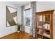 Charming office space with bookshelf, modern art, and natural light at 2498 Perry Nw Blvd, Atlanta, GA 30318