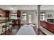 Open Kitchen with stainless appliances, wood cabinets, and barstool seating at 2725 Monet Dr, Cumming, GA 30041