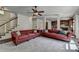 Open-concept living area with hardwood floors and comfortable seating at 2725 Monet Dr, Cumming, GA 30041