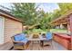 Inviting back deck with cushioned seating, perfect for relaxing near the spa at 4364 Saddlecreek Ct, Auburn, GA 30011
