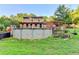 The backyard showcases an above-ground pool and well-maintained grassy area at 4364 Saddlecreek Ct, Auburn, GA 30011