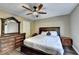 Relaxing bedroom with a bed, dresser, and ample natural light for a serene retreat at 4364 Saddlecreek Ct, Auburn, GA 30011